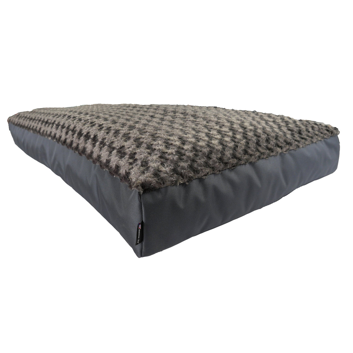 Gray-brown swirl plush rectangle dog bed with gray ballistic nylon sides, viewed from the corner