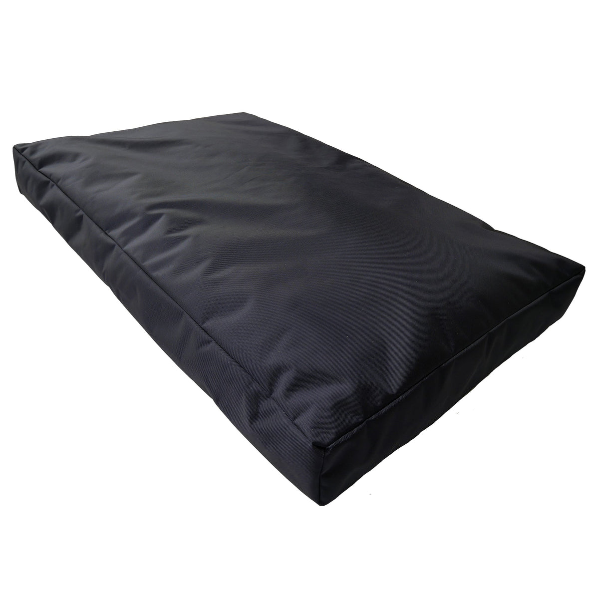 Black rectangular Armor dog bed shown at an angle with piped edge seam