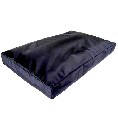 Rectangular dark fabric dog bed with flat cushioned base