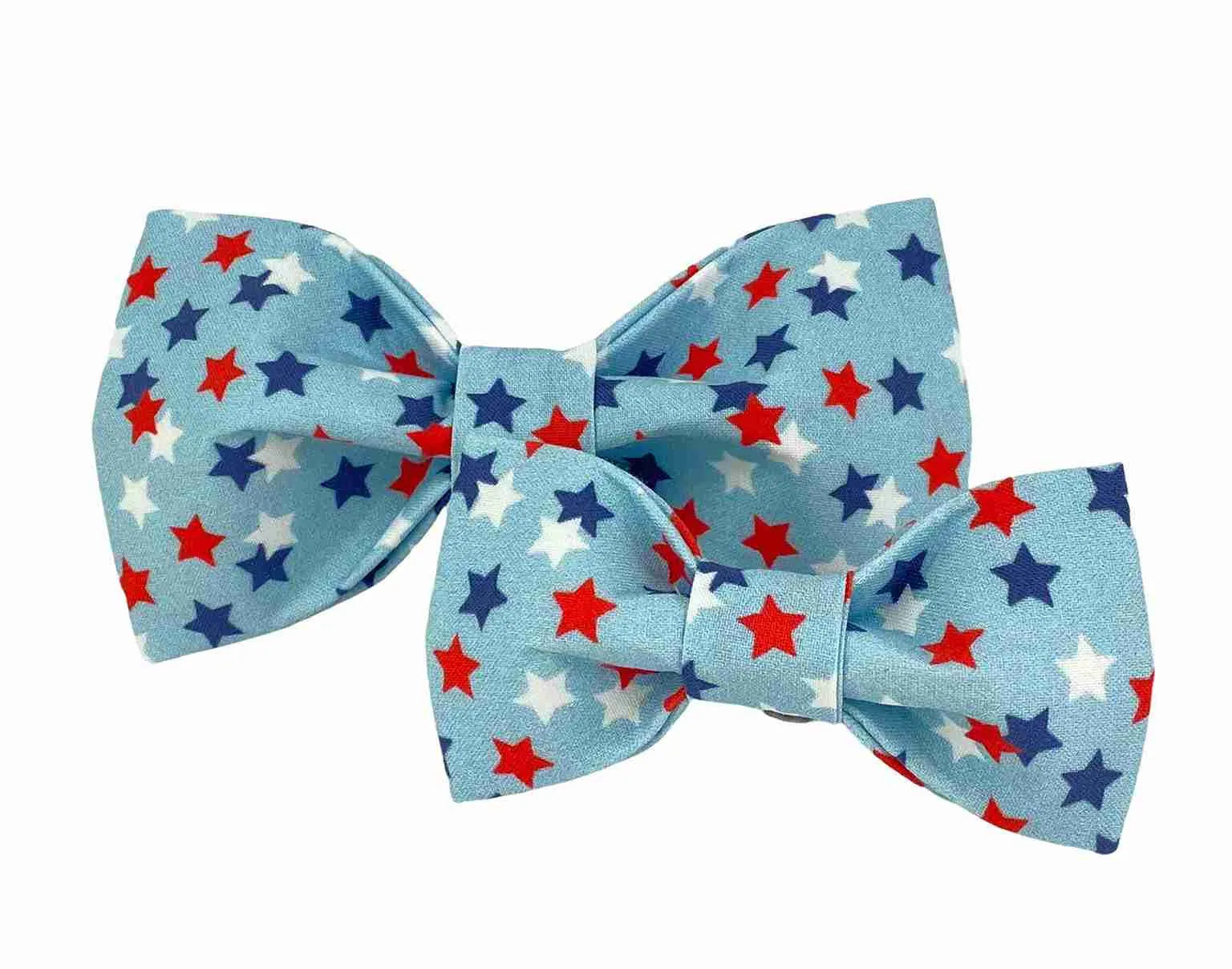 Two Red White Blue Stars Dog Bow Ties made in America, patriotic pet accessories on white background.